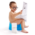 Child ready the newspaper during potty training